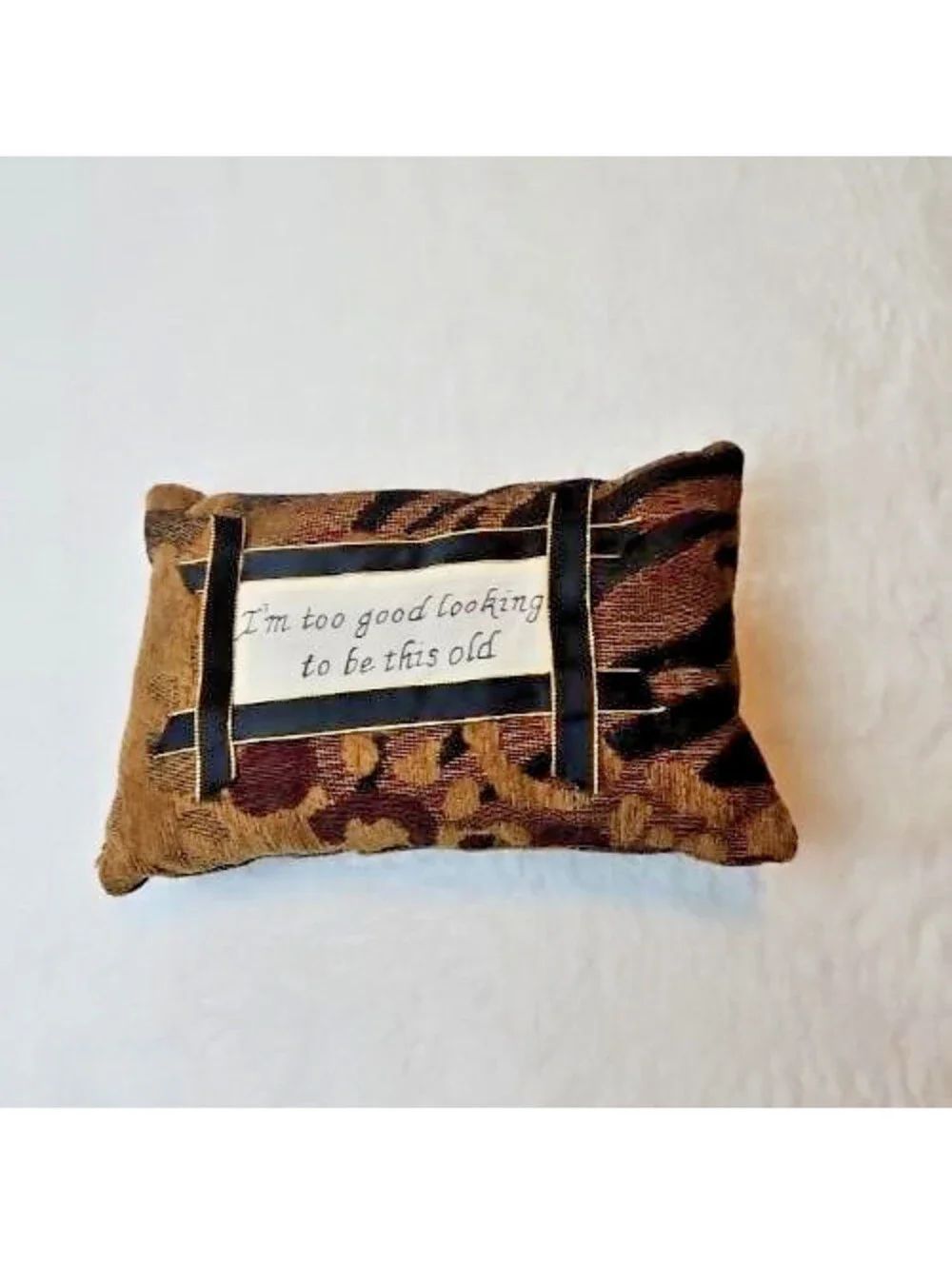 Woven Tapestry Accent Pillow (Unbranded) features and animal-print pattern.